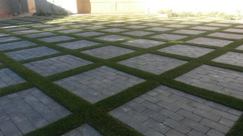 Property Value and Curb Appeal: Turfing vs. Concrete Sealing